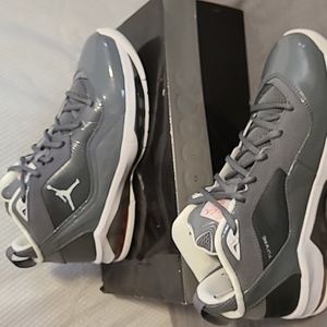 New,  JORDAN MELO M8 size 9. Cool grey/white-orange flash